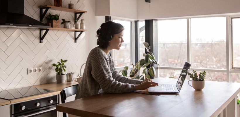 person remote working as a digital nomad abroad