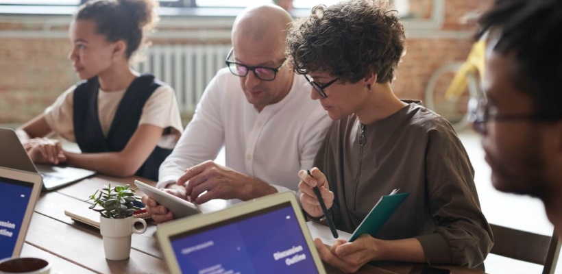 project managers resource planning around a table