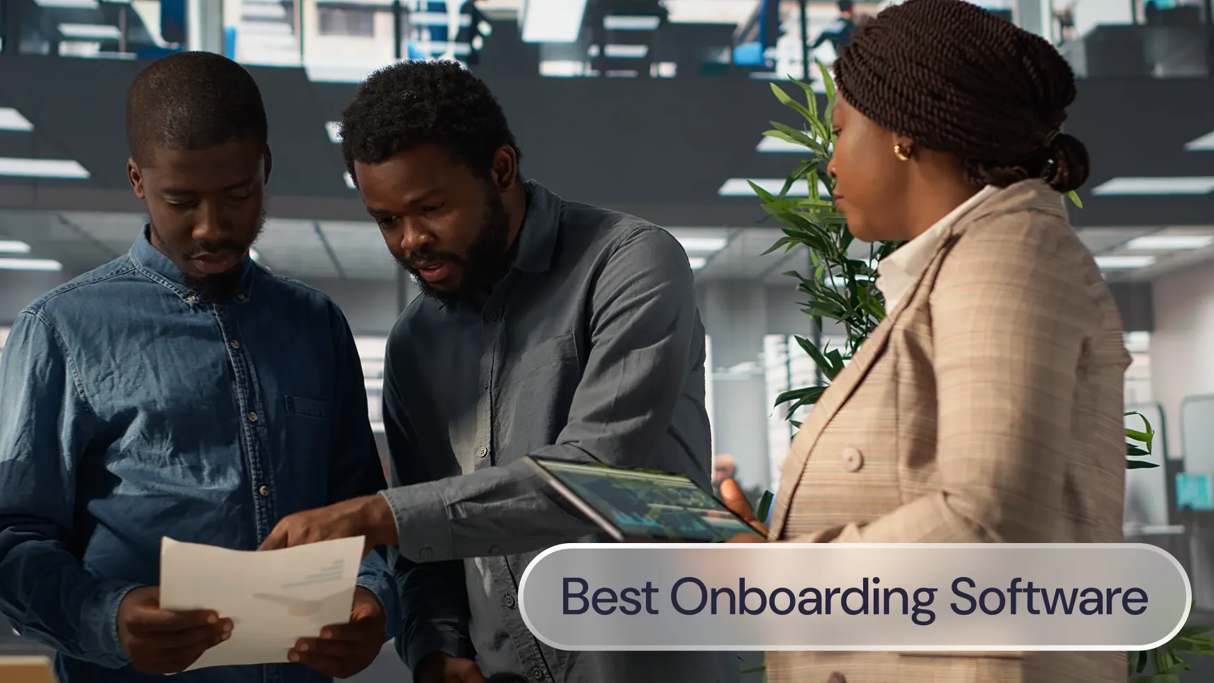 Three people discussing employee onboarding, with the label: Best onboarding software