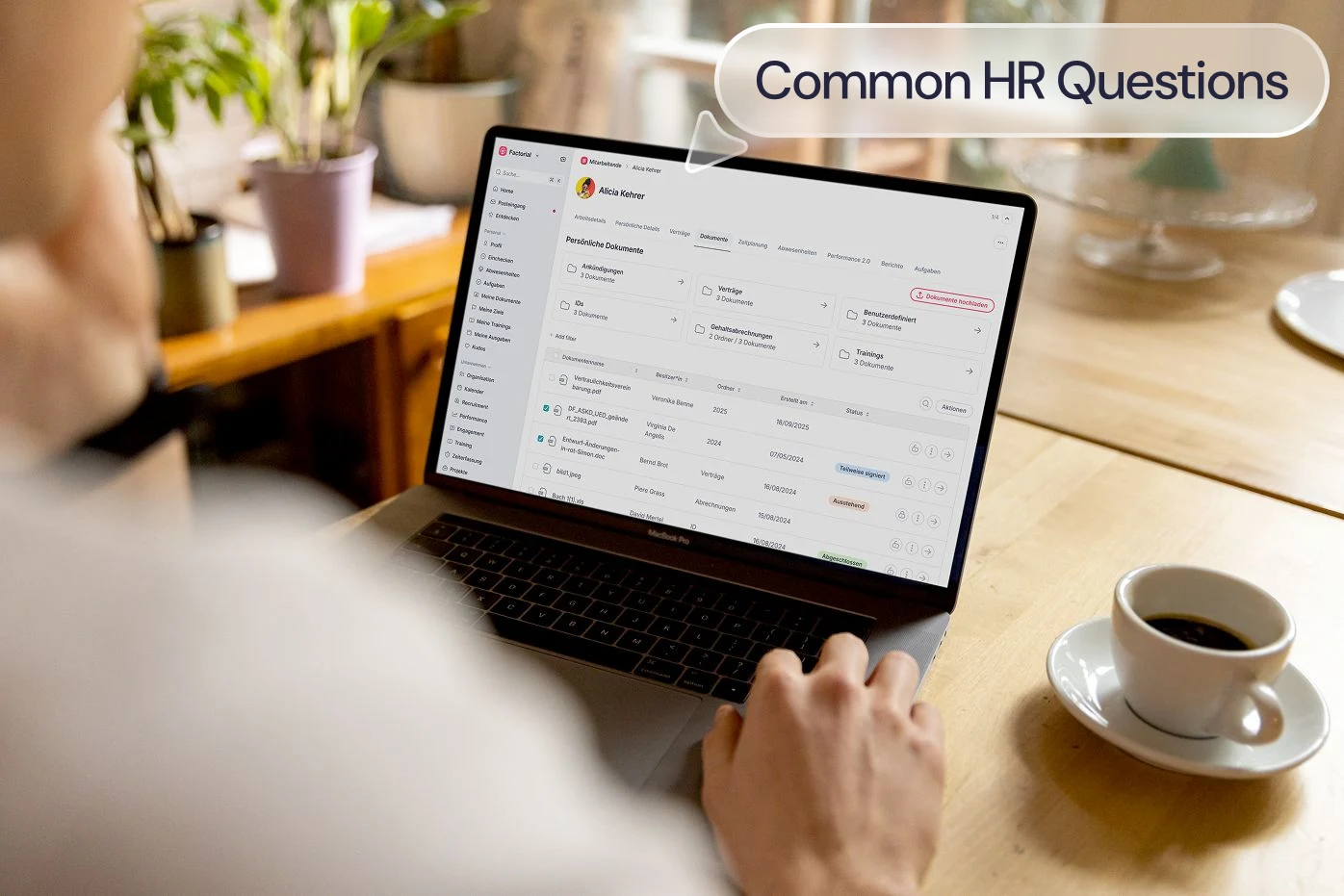 A person working at a laptop with the label: common HR questions